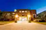 exterior photo of the library at dusk