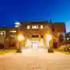 exterior photo of the library at dusk