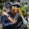 Graduand and reletive posing for ceremony