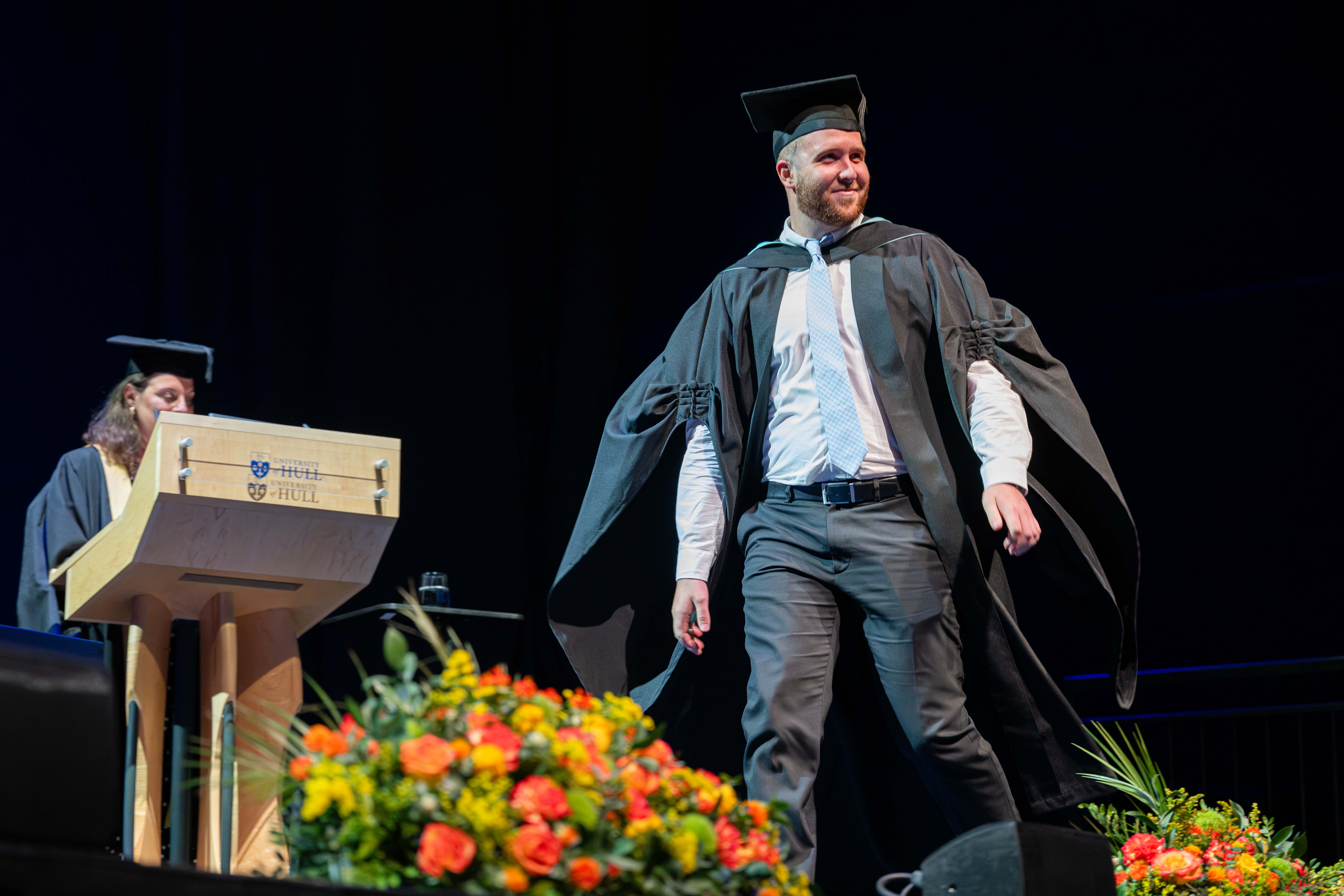 A graduate taking to the stage.