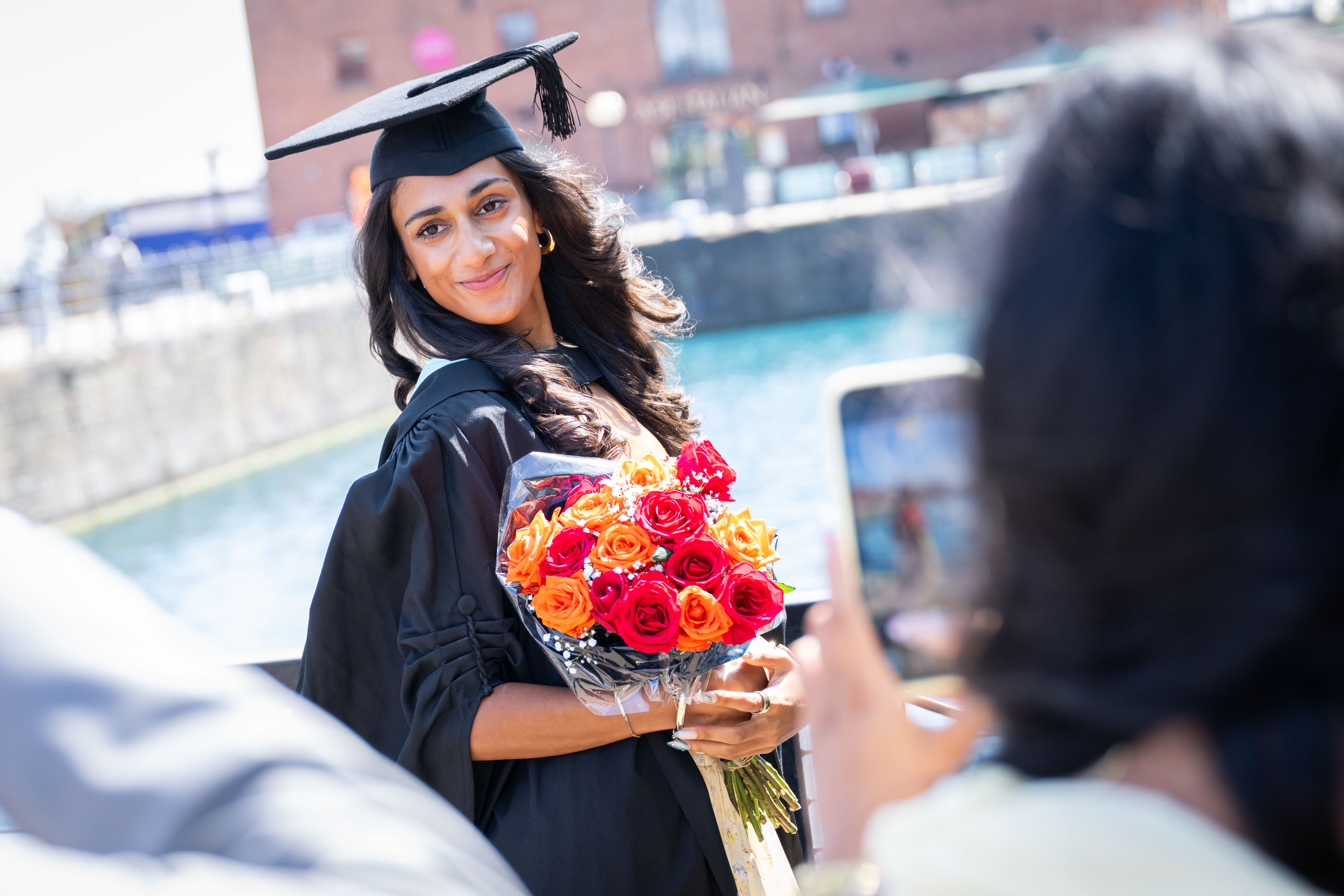 Recent graduate celebrating. 