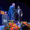 Graduate on stage with the Vice Chancellor.
