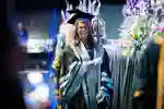 Robed University staff member holding the University of Hull Mace