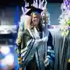 Robed University staff member holding the University of Hull Mace