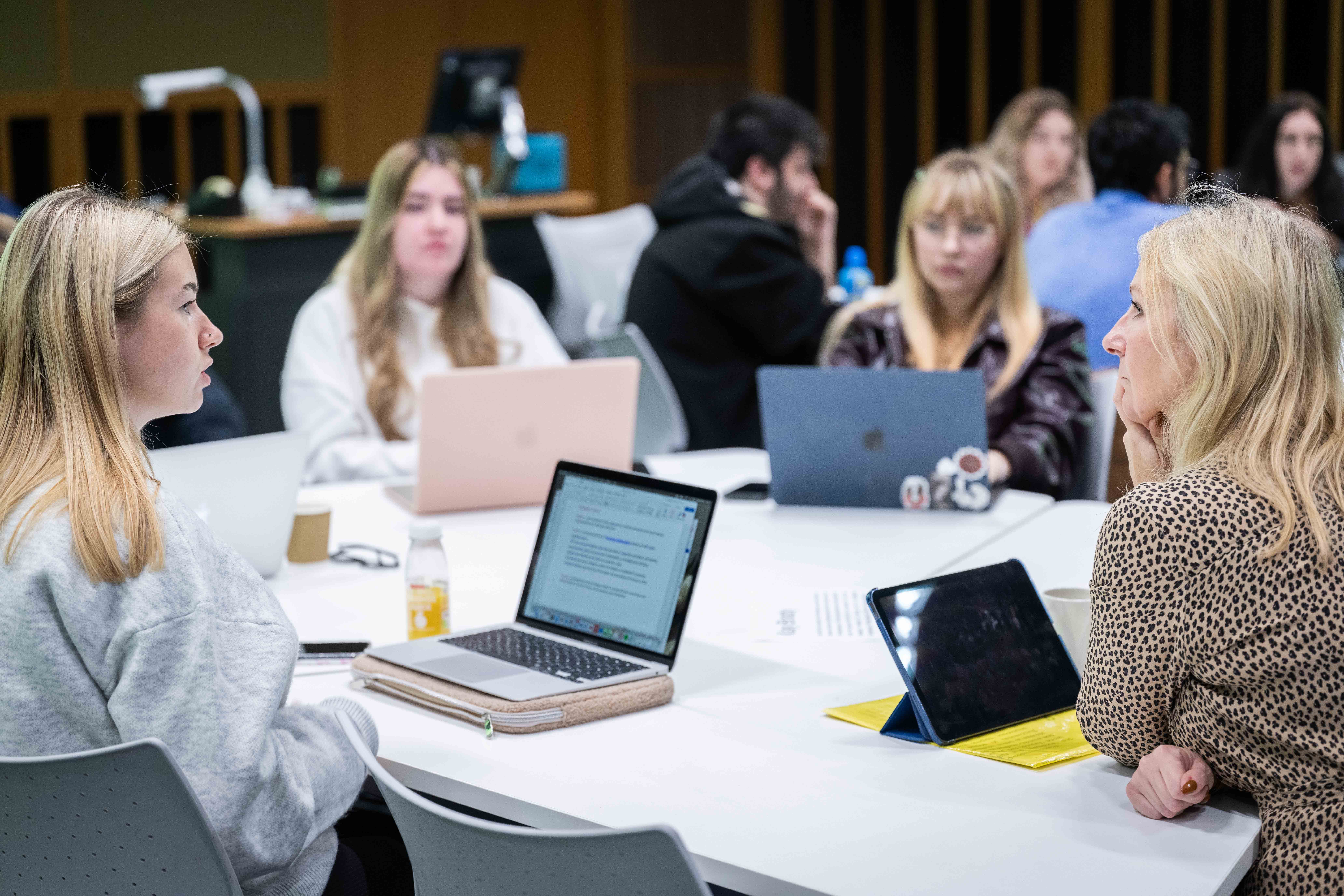 a group of students in a seminar