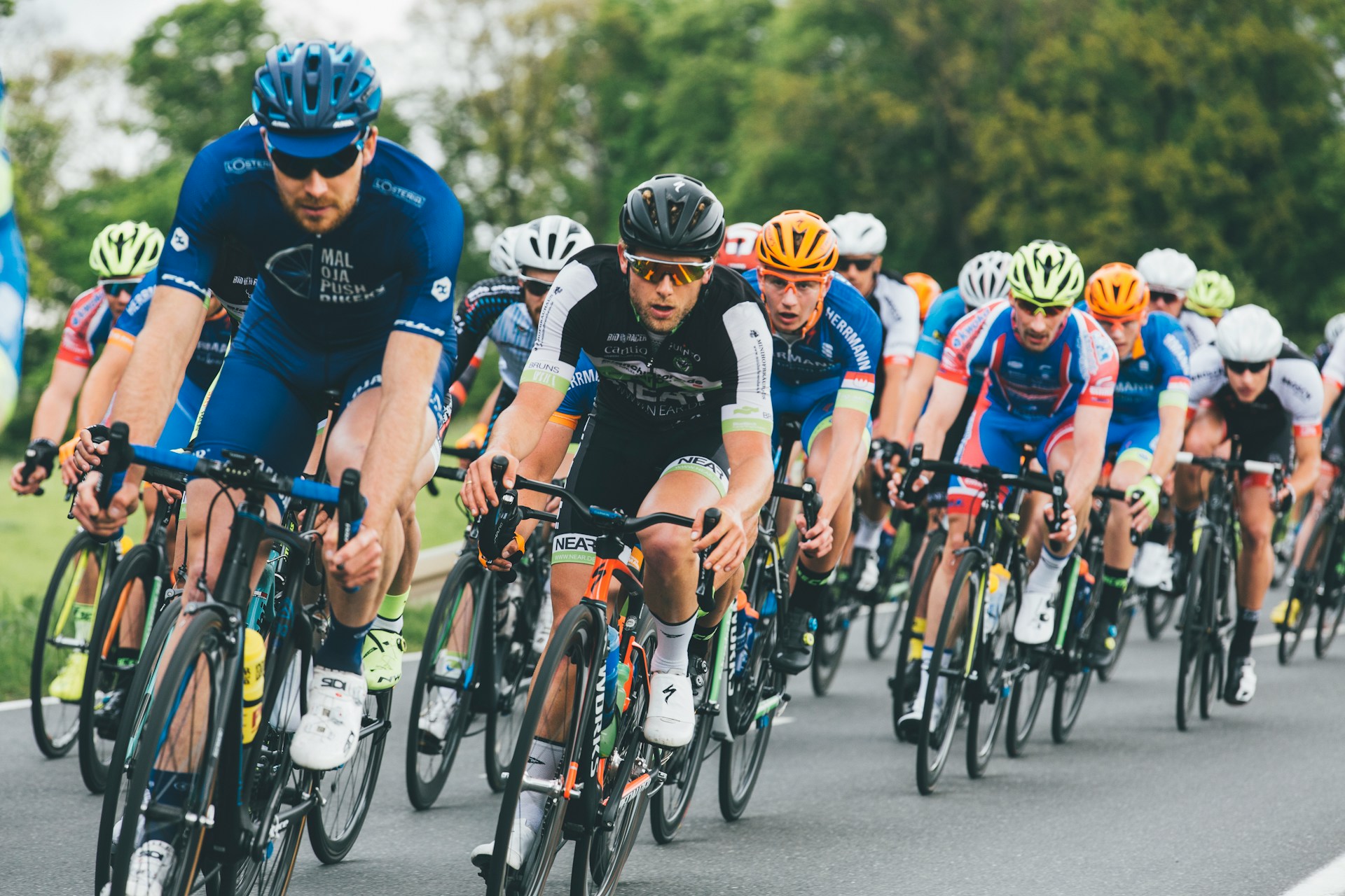 A large group of cyclists in a road race