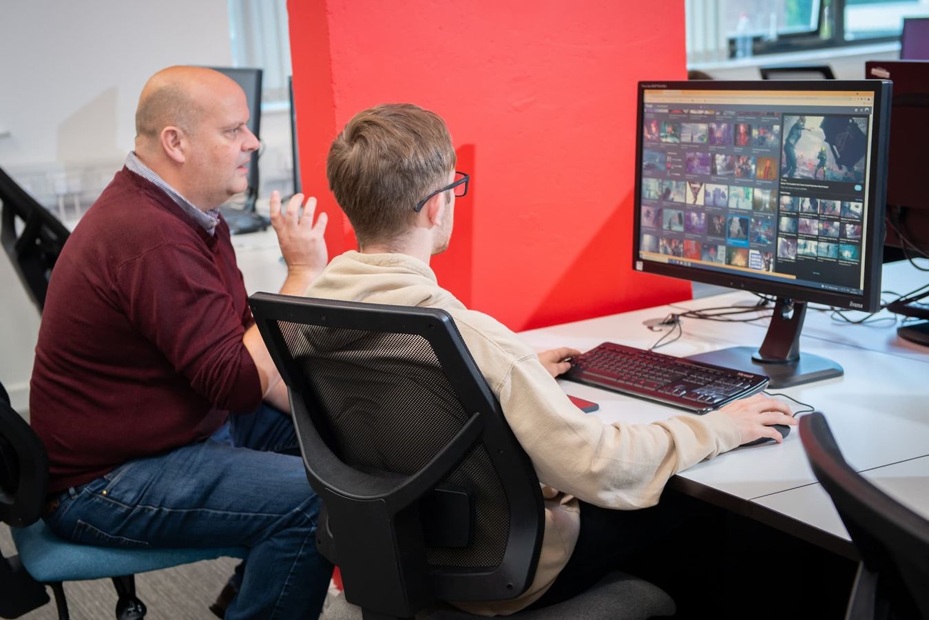 Student and lecturer using a PC in the Digital Design laboratory