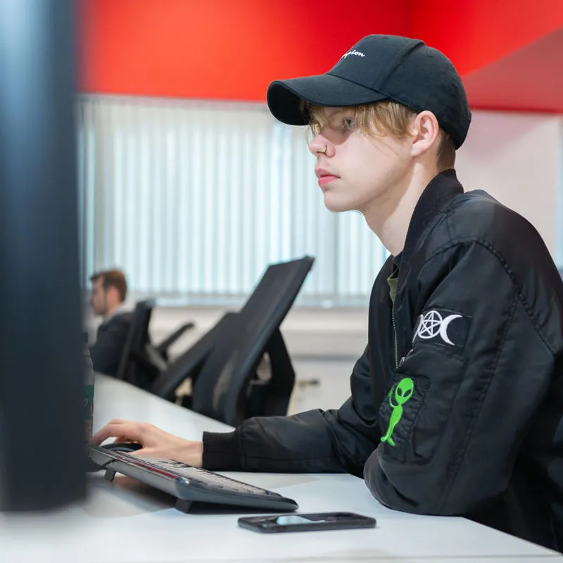 Design student using computer in the design suite