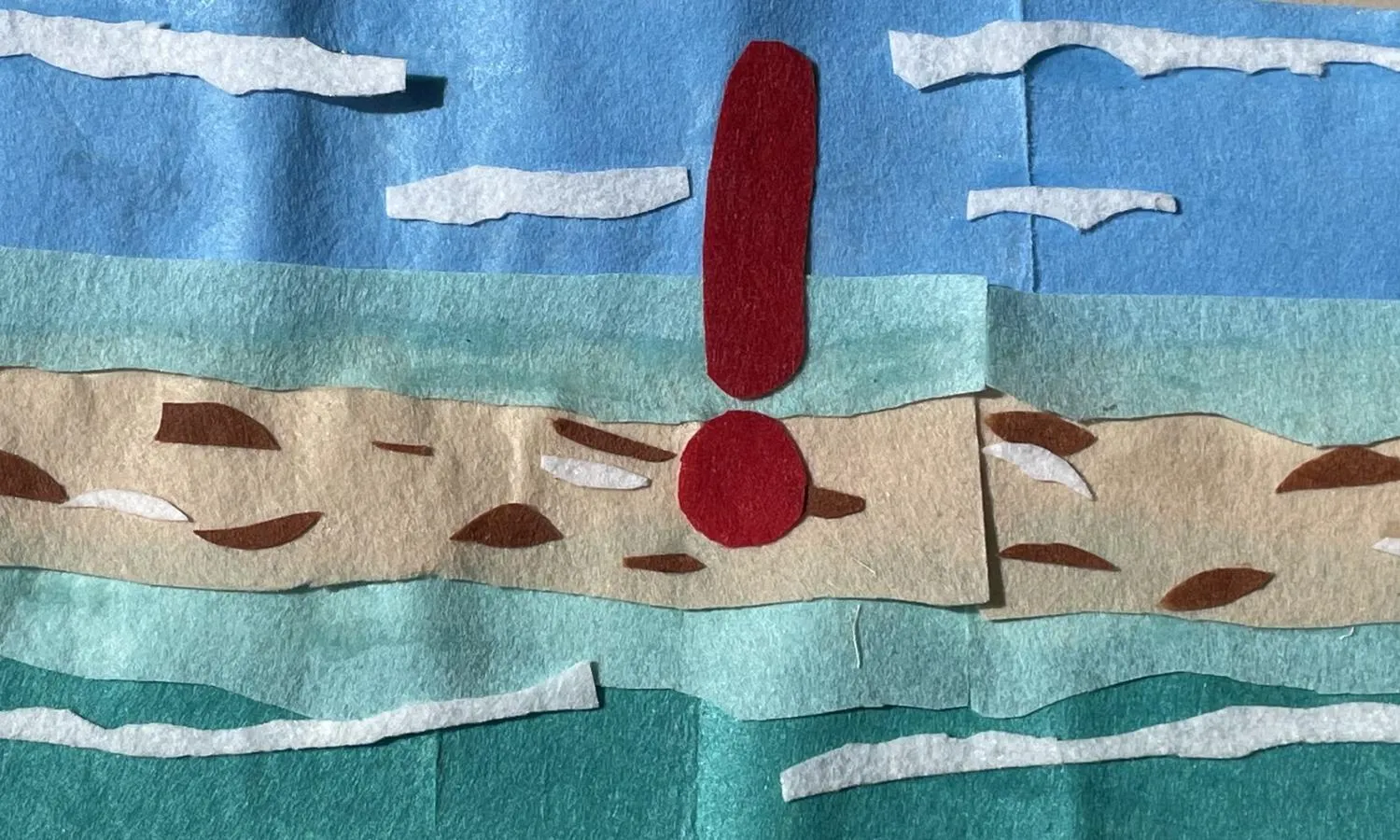 A beach flag made of felt.