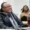 student smiling in classroom