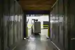 Forklift truck carrying boxes