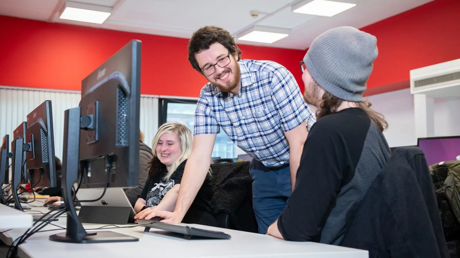 teacher helping student