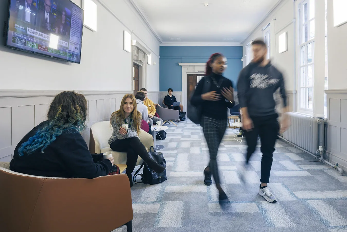 Students meeting in Executive Education Suite