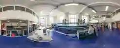 A panoramic image of the flume lab, containing a large tank filled with water