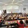 An academic speaking to a class in a flood risk management lecture