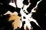 Students in a circle throwing thier graduation hats in the air