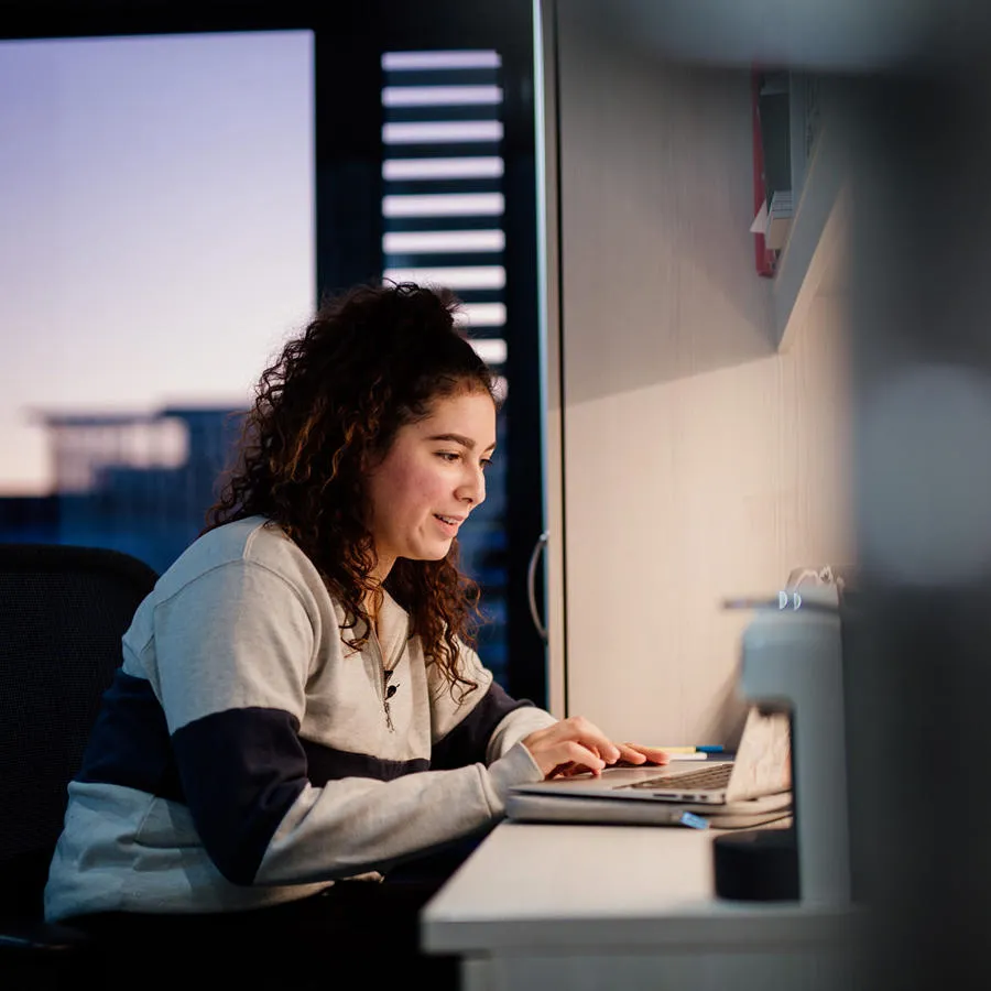 Student at desk on laptop