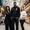Three students in Hepworths Arcade