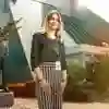 A lecturer smiling
