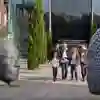 HUBS Nidd Building with Undergraduate Students & Head Statues