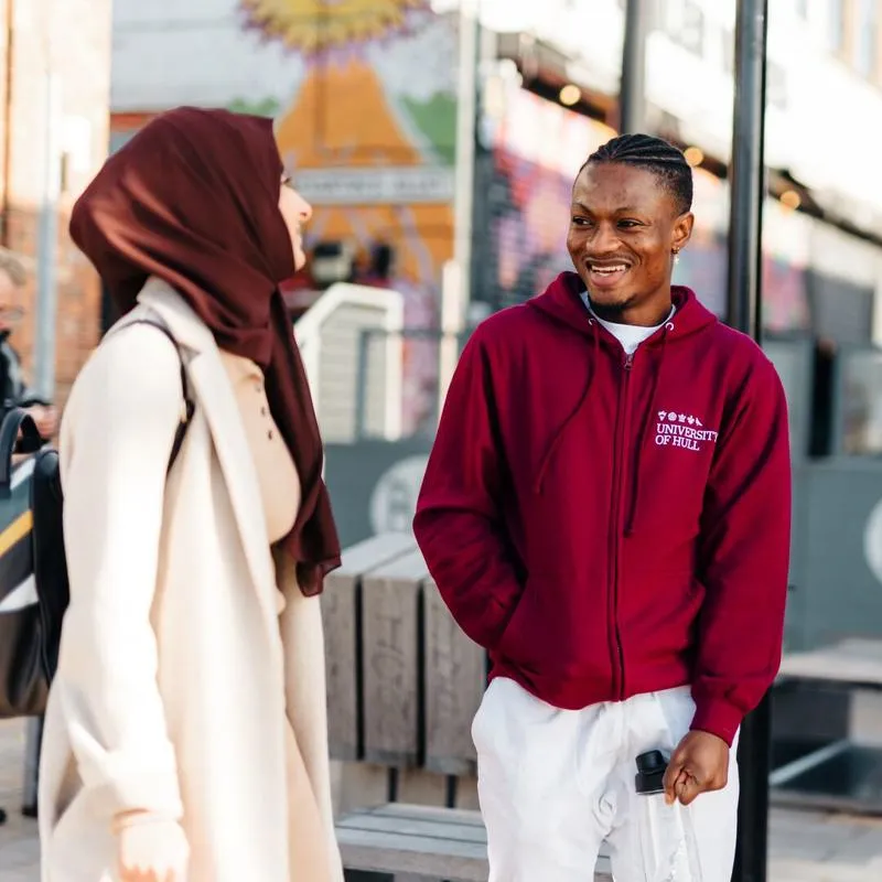 Students talking to each other on Humber Street in Hull