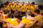 Hull Roundheads team, in yellow kit in a changing room