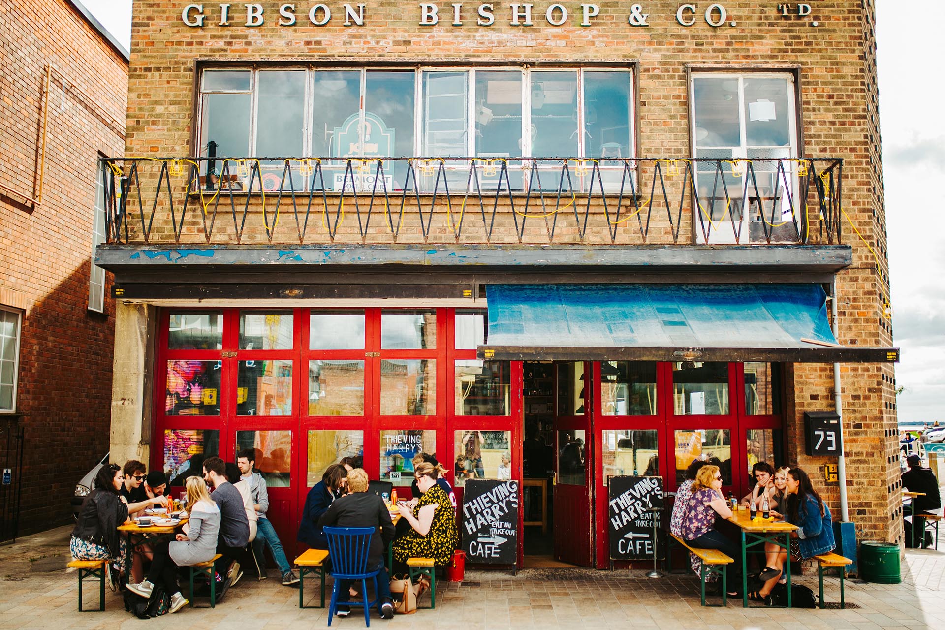 groups sitting outside a cafe in Hull