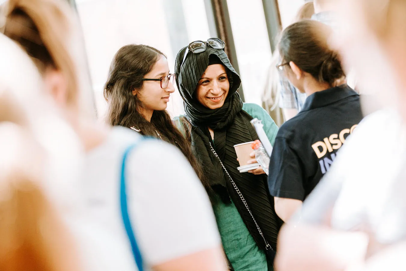 A group of students at an event on campus