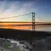 humber bridge at sunset photo taken from hessle foreshore
