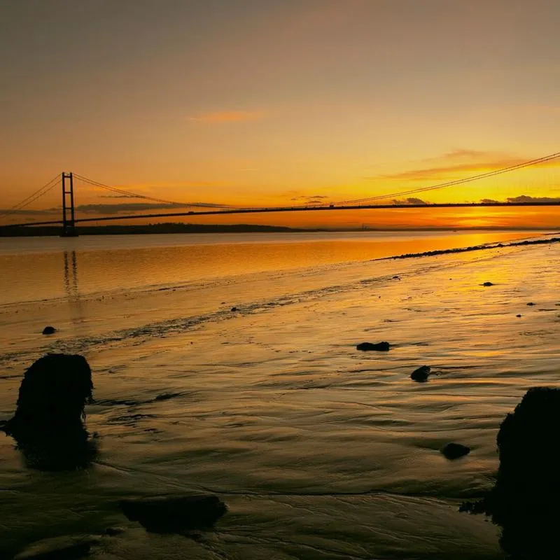Sunset over the Humber Bridge near Kingston upon Hull, East Yorkshire, UK. Linking East Yorkshire and Lincolnshire