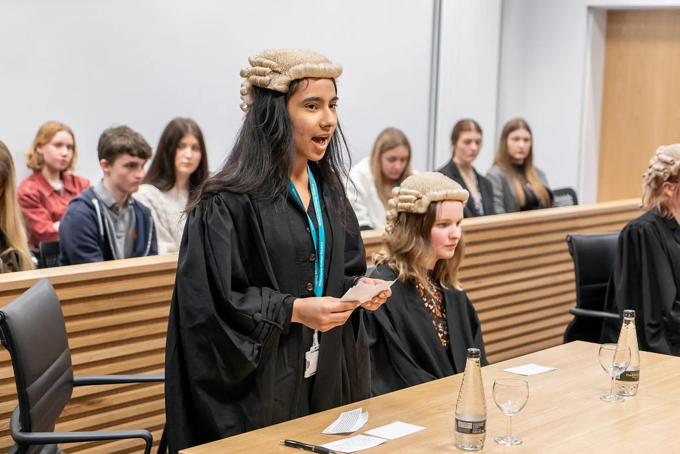 Student speaking in a mock court room
