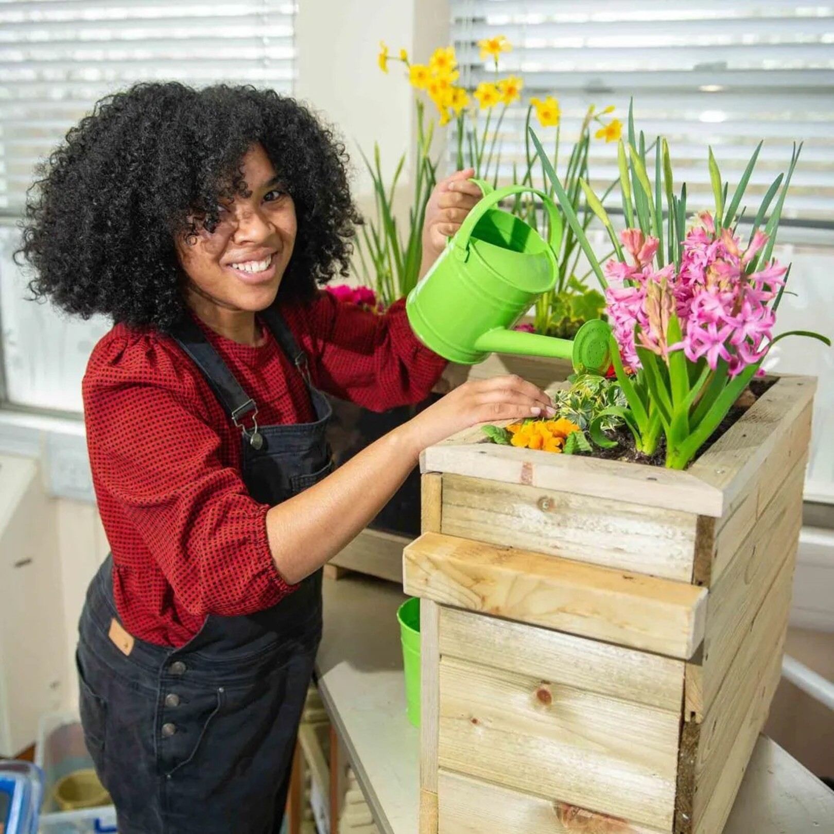 A woman watering plants