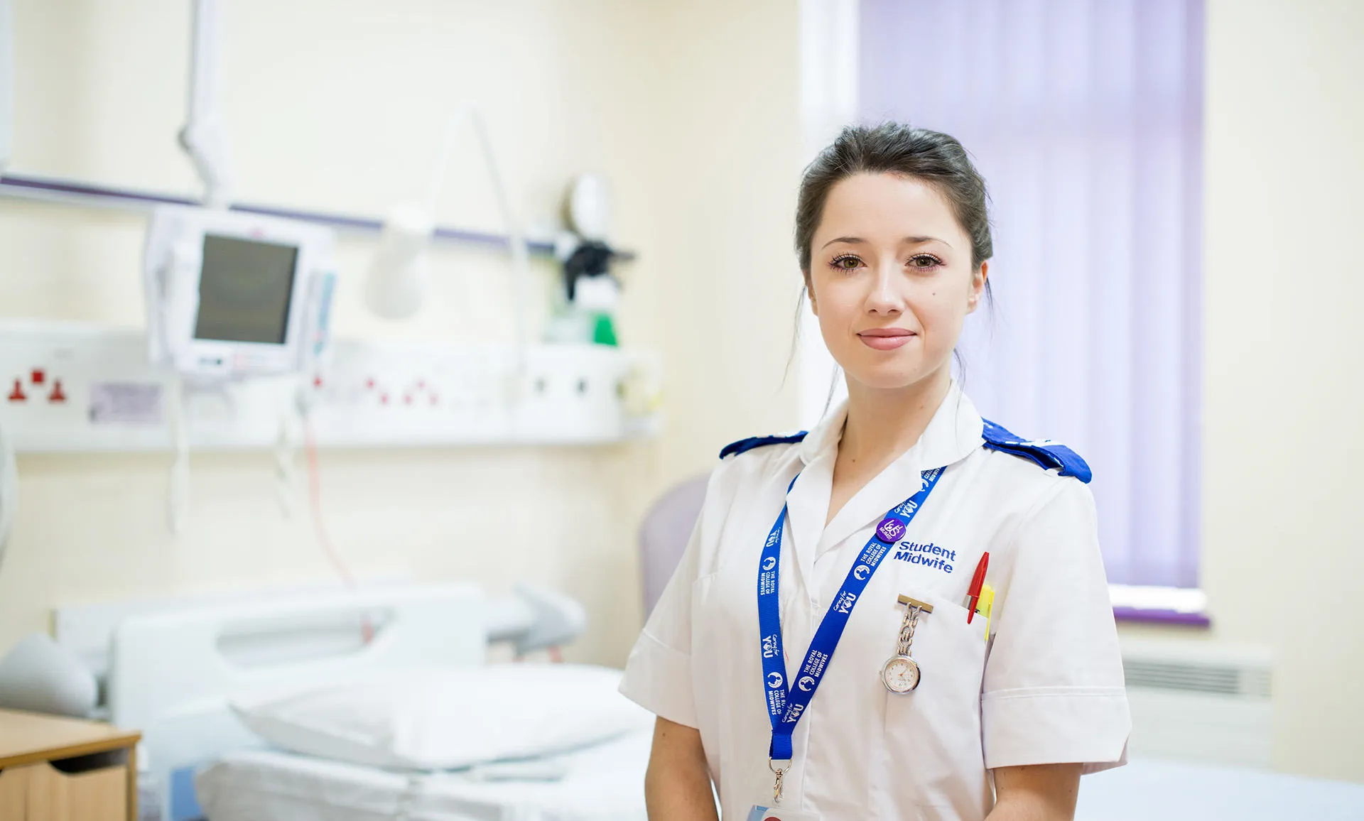 A midwifery student in white uniform at Hull Women and Children's Hospital