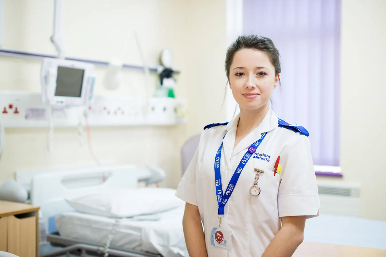 A midwifery student in white uniform at Hull Women and Children's Hospital