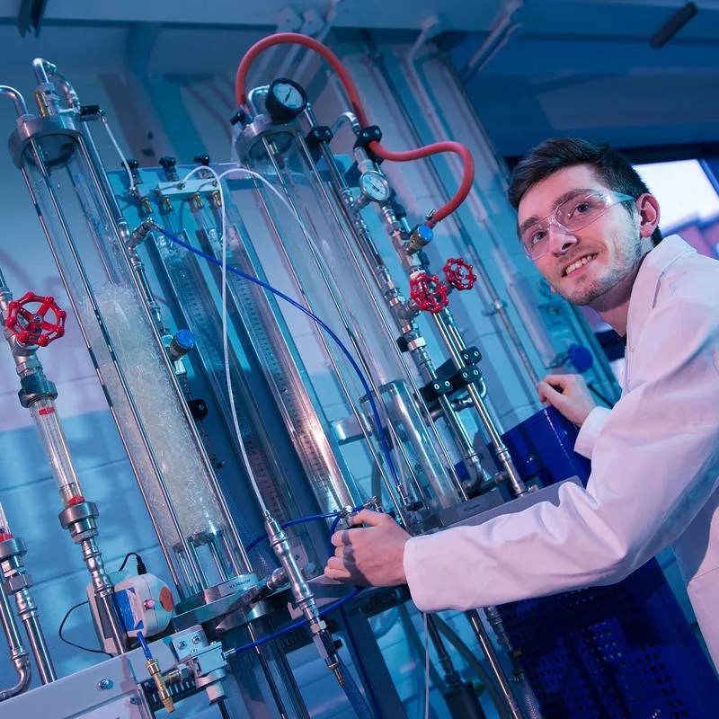 Student working with lab equipment