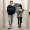 Two students walking down a corridor in the Legal Advice Centre