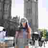 Politics student, Lucy Dunwell, stands in front of the Houses of Parliament while on placement in Westminster.