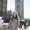 Politics student, Lucy Dunwell, stands in front of the Houses of Parliament while on placement in Westminster.