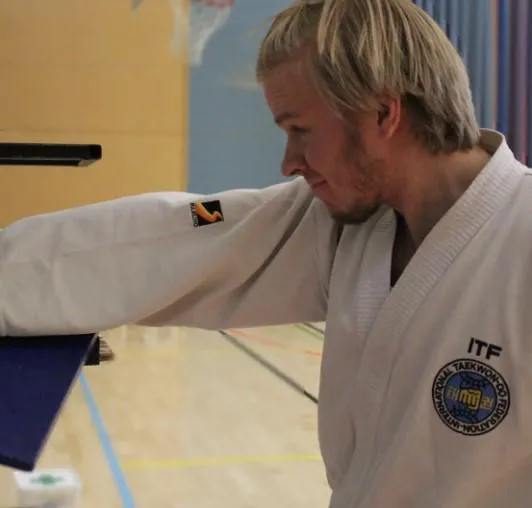 Male in karate outfit