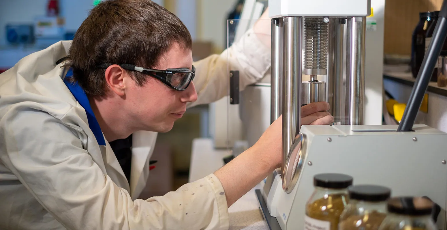 Dr Martin Taylor setting up laboratory equipment
