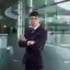 Mechanical engineering student wearing a suit at McLaren headquarters