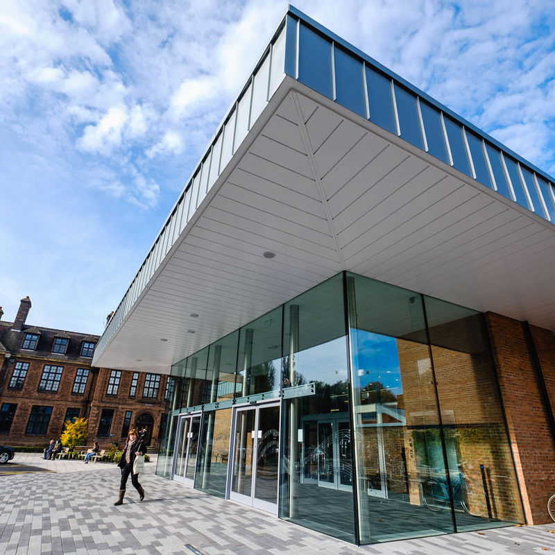The exterior of the Middleton hall building which is modern style glass and steel pavillion