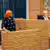 Student standing in the dock of the mock law court