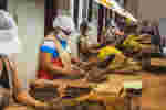 Modern slaves pack hessian bags in squalid conditions