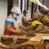 Modern slaves pack hessian bags in squalid conditions