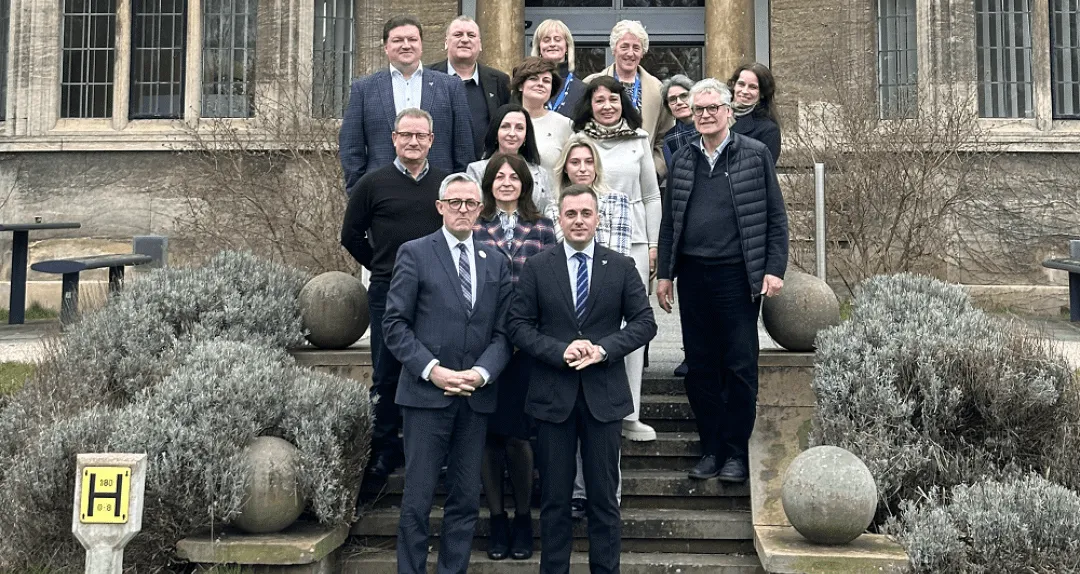 MSU academics stood infront of Hull's Derwent building