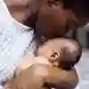 Mum holding new born baby