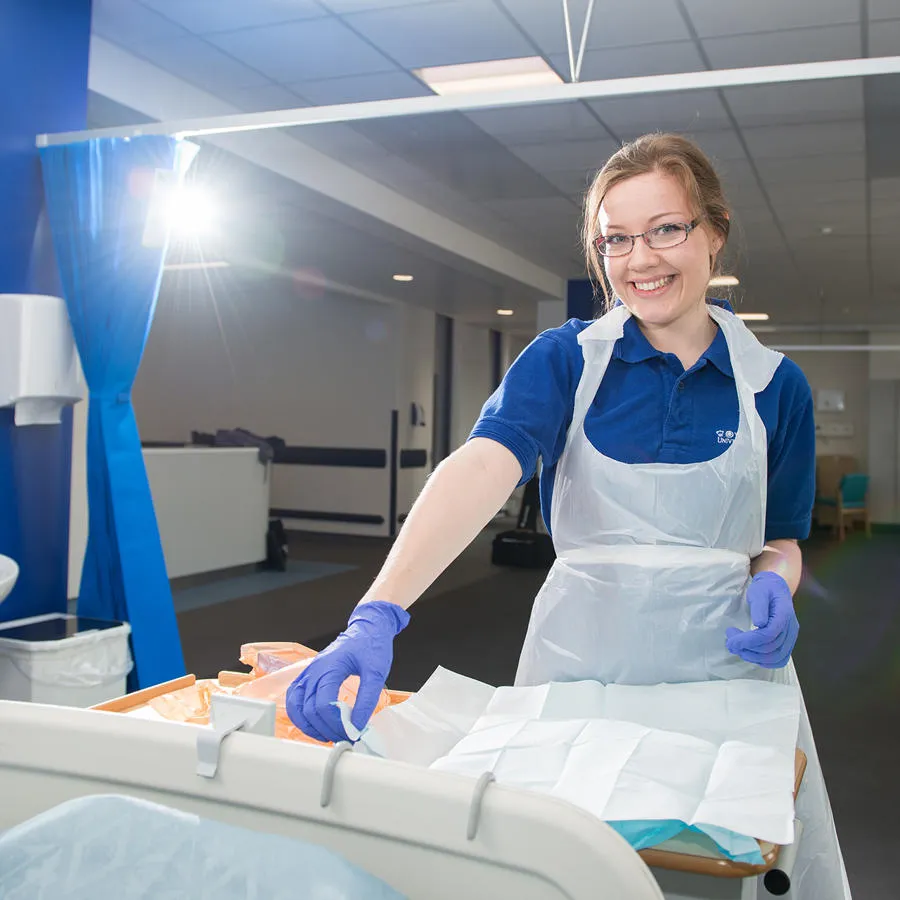 A nurse tending to her duties