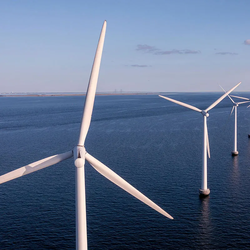 Aerial view of offshore wind turbines at sea