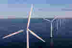 Aerial view of offshore wind turbines at sea